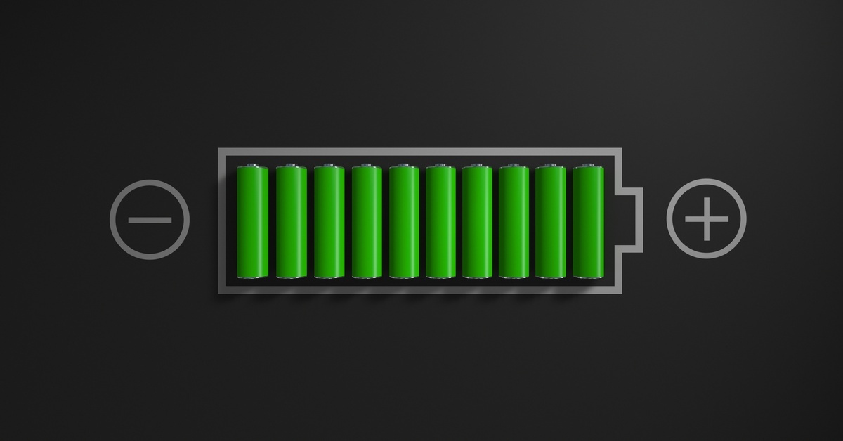 An outline of a battery that has green charging lines in the center. A plus sign and a minus sign are on each side of the battery.